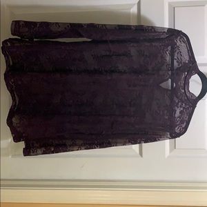 Sheer purple shirt with key hole